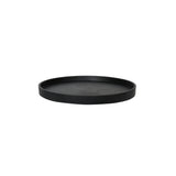 Runde schwarze Untersetzer von Pottery Pots auf einem hellen Tisch, ideal für Tassen und Gläser.