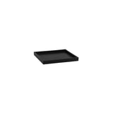 Black coaster block by Pottery Pots, showcasing a sleek design and smooth finish on a white background.
