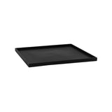 Black Pottery Pots coaster block with a sleek design, displaying a smooth surface and rounded edges on a light background. [mc]